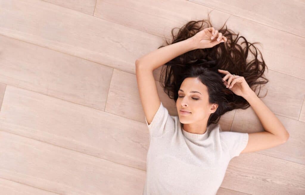 A Girl Sleeping on the Floor