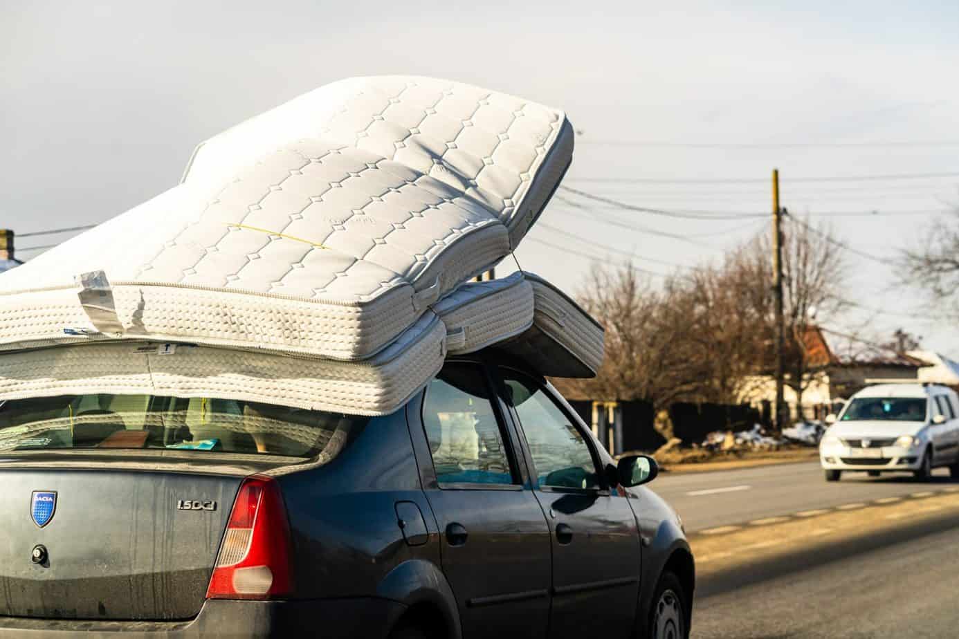 moving a mattress on top of a car