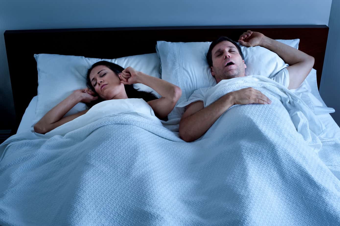 Snoring Man in Bed with Wife