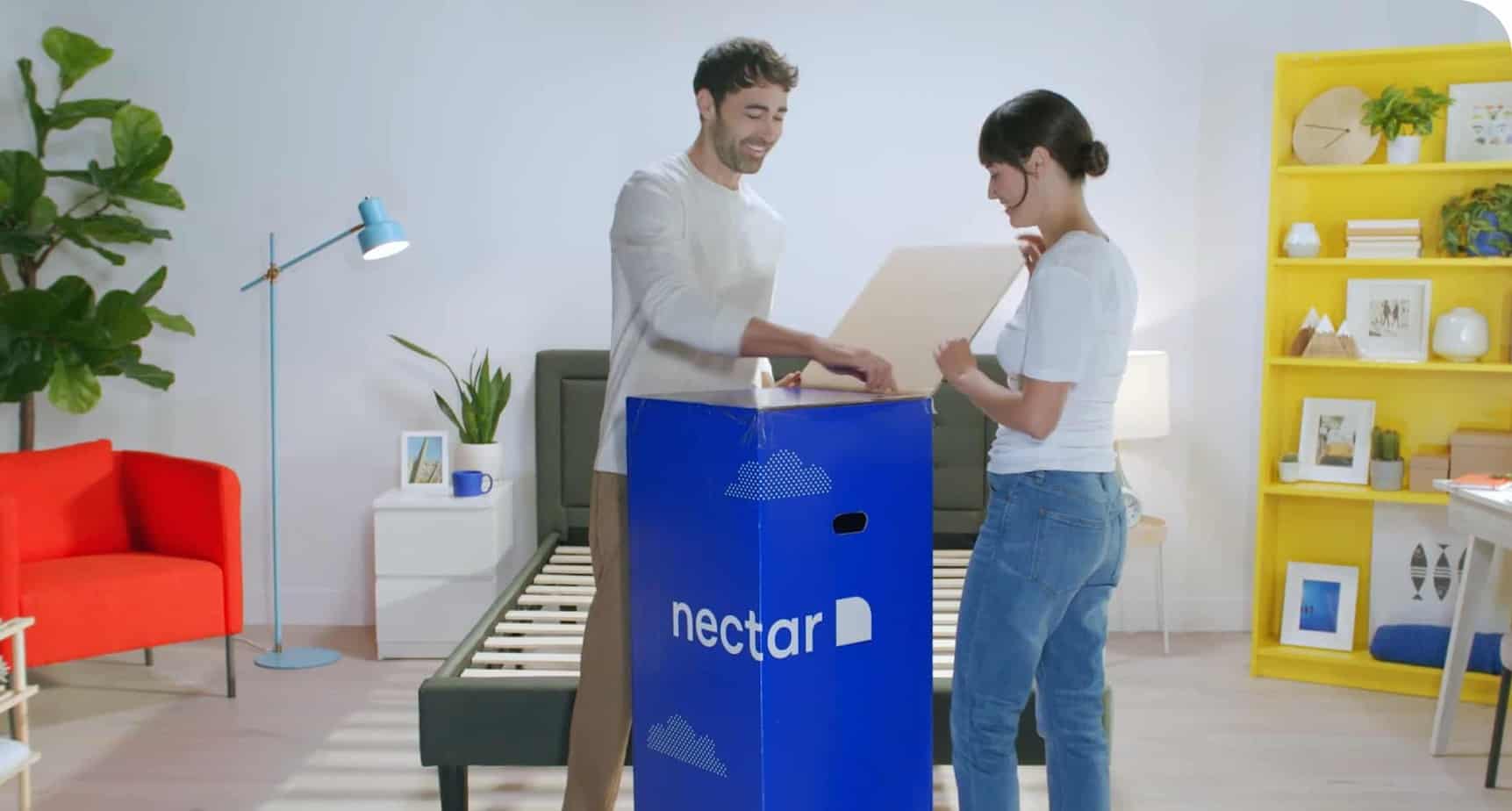 couple unboxing nectar mattress